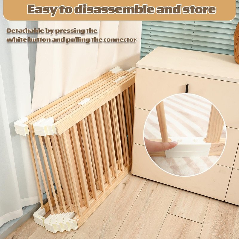 Wiping the playpen clean with a cloth
